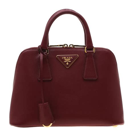 prada vela handle bag|prada maroon handbag.